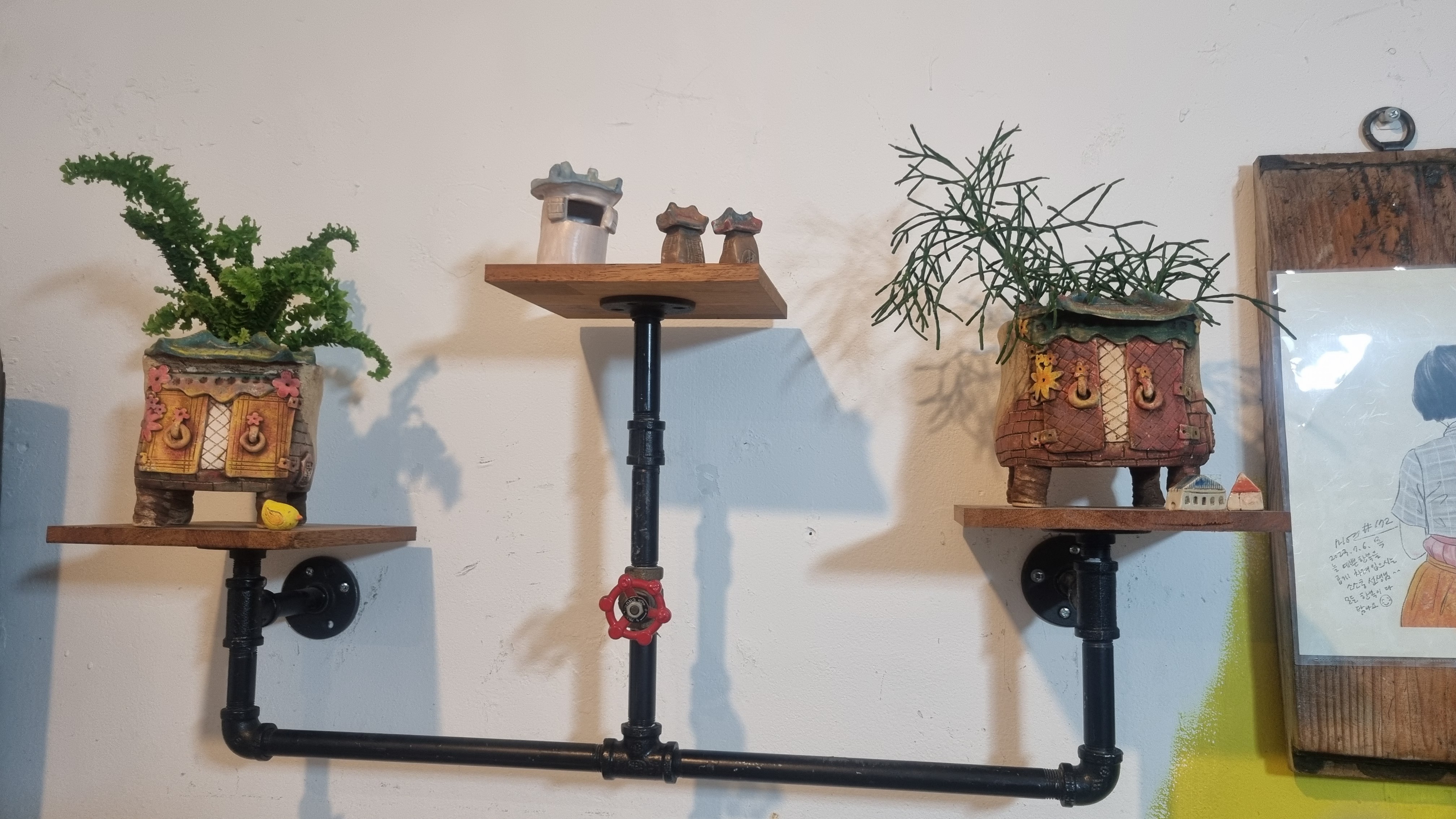 Wall mounted pottery display